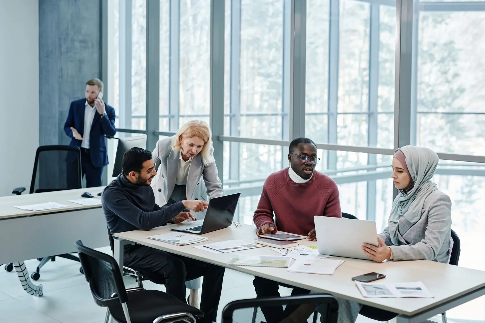 A lending team reviewing a customer's account on screen
