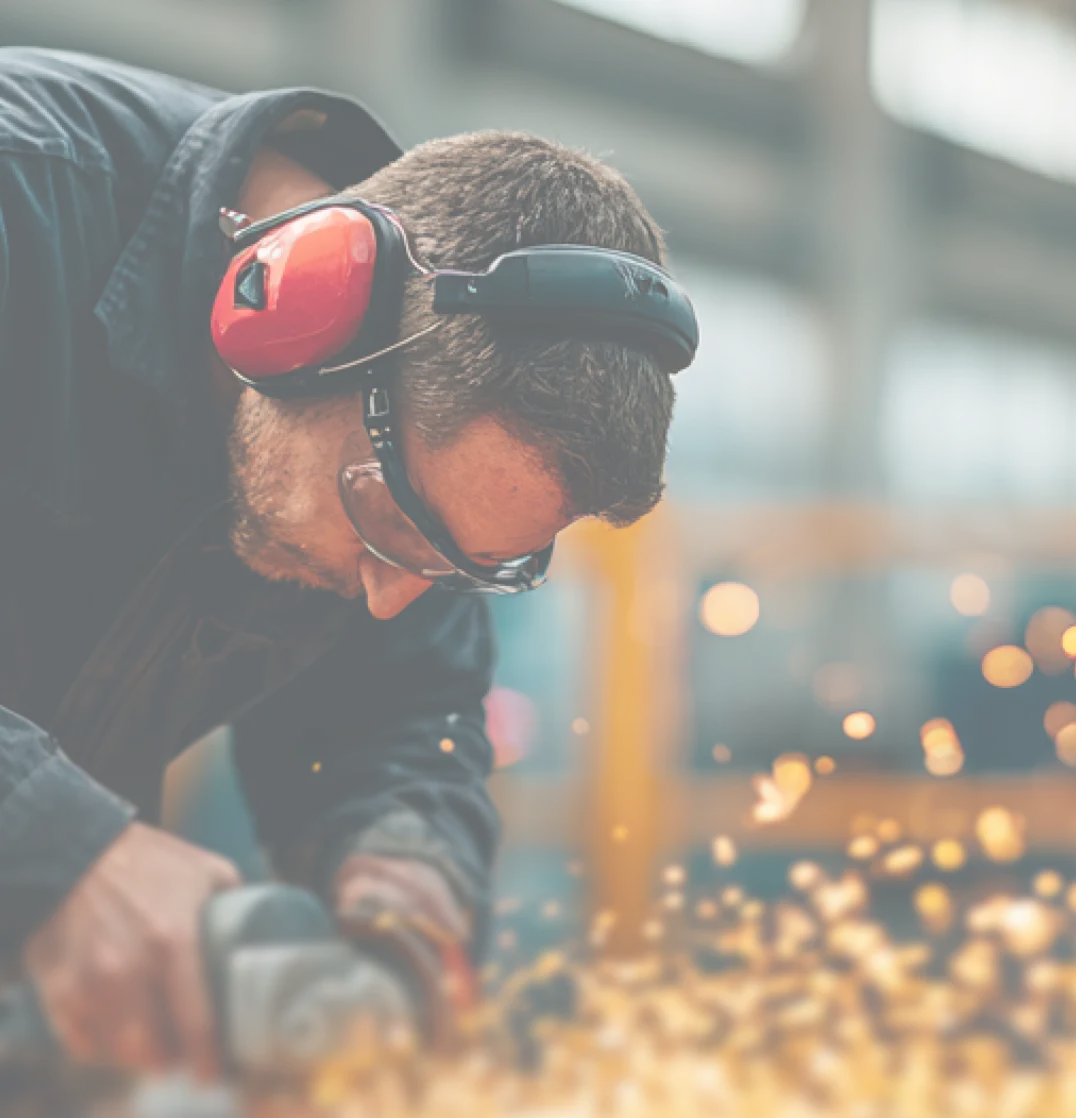 Manufacturing worker with machinery